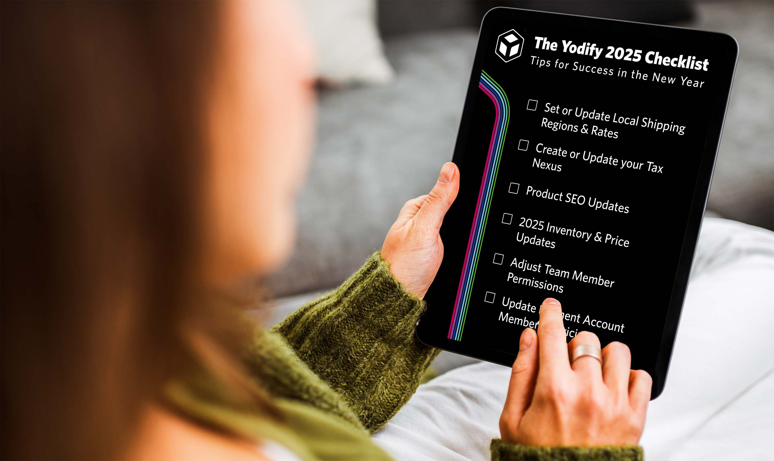 A professional checking off their Yodify new years checklist for their b2b site